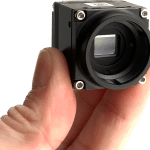 IrLugX640 thermal camera module held with two fingers