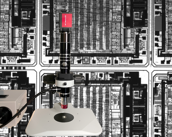 SWIR microscopy setup including camera and optics for semiconductor inspection